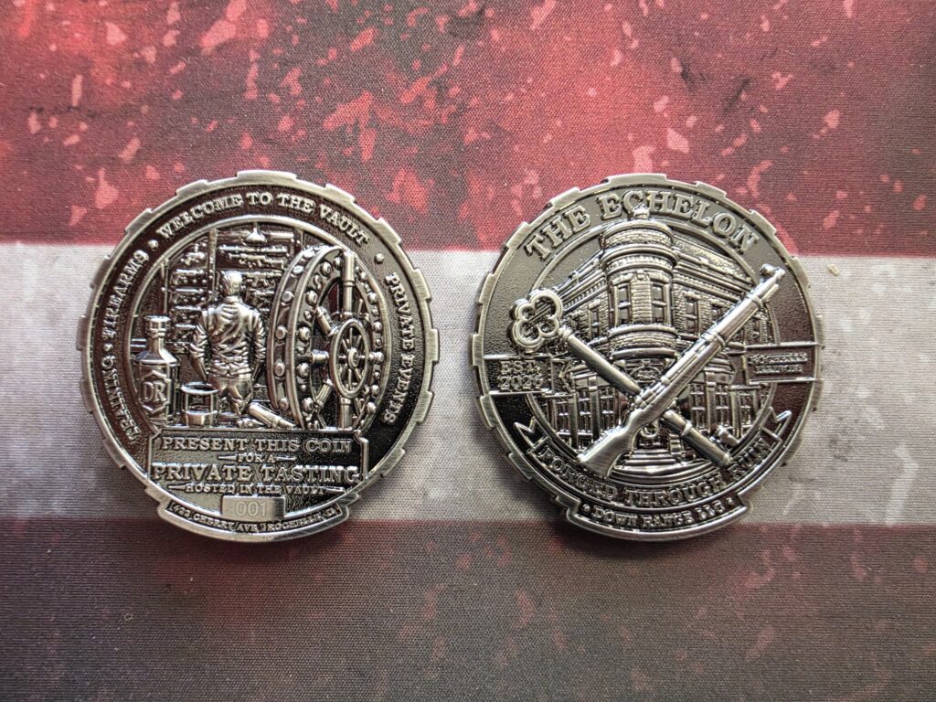 Two Down Range challenge coins